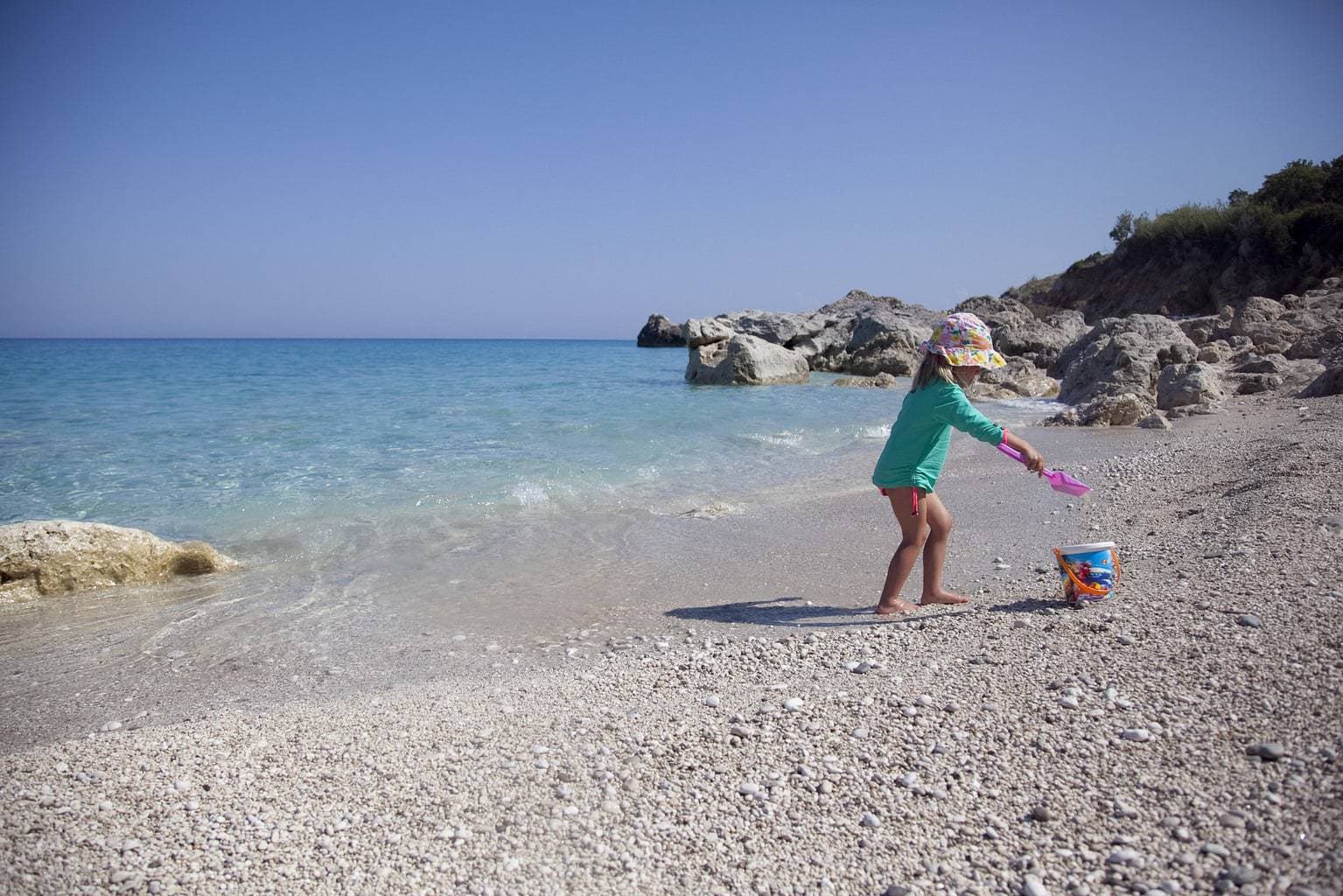 Girl on the beach in Greece