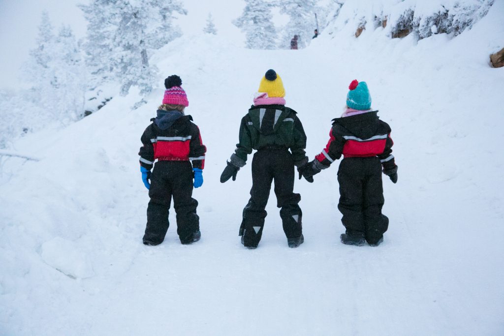 Children enjoying the snow at Lapland. Part of my 20 Top Tips for visiting Lapland with kids - Read my tips at www.minitravellers.co.uk