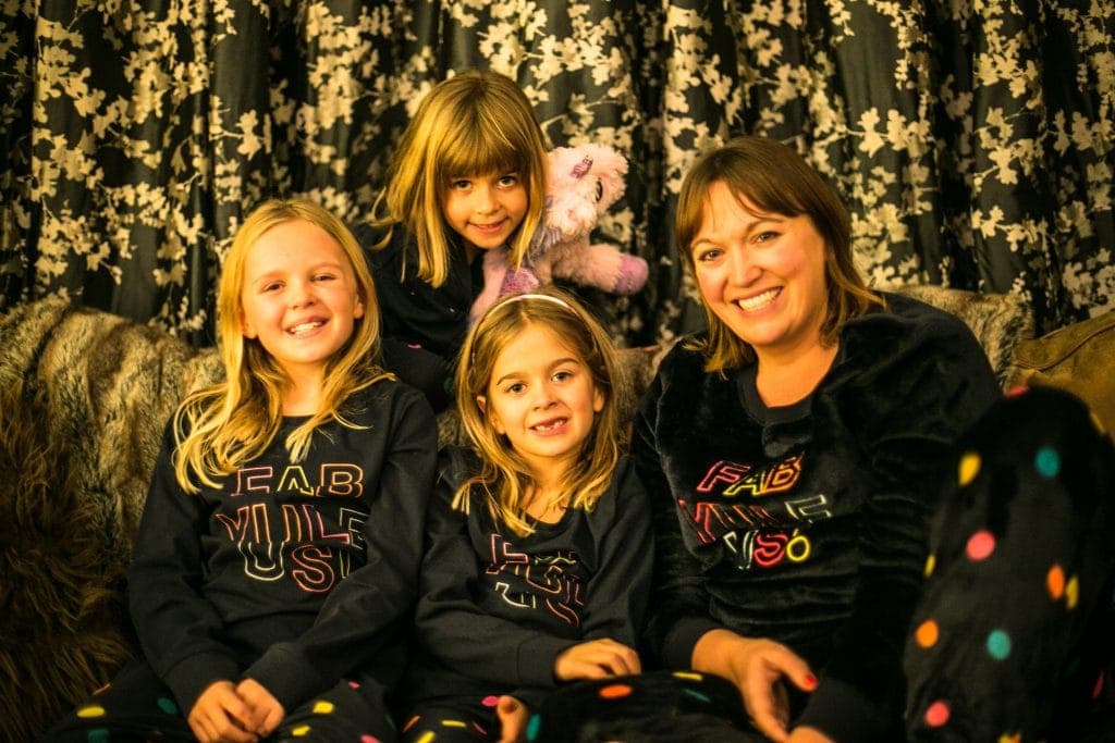 Matching cosy Christmas pjs for a family night in